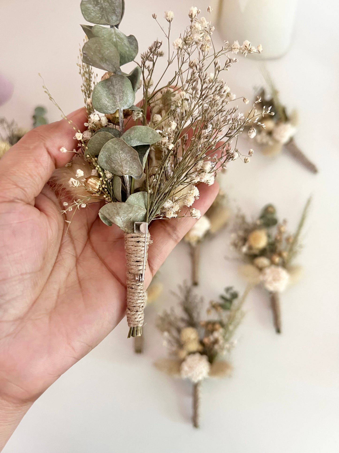 Sage green boutonniere