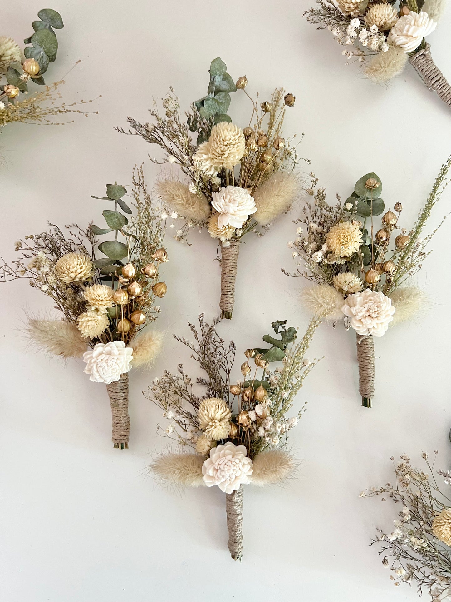 Sage green boutonniere